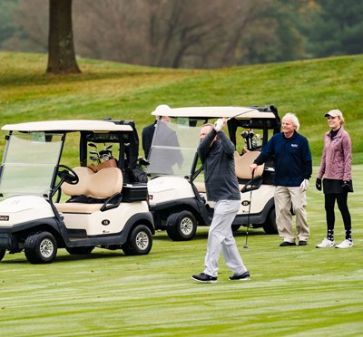 Friends playing golf