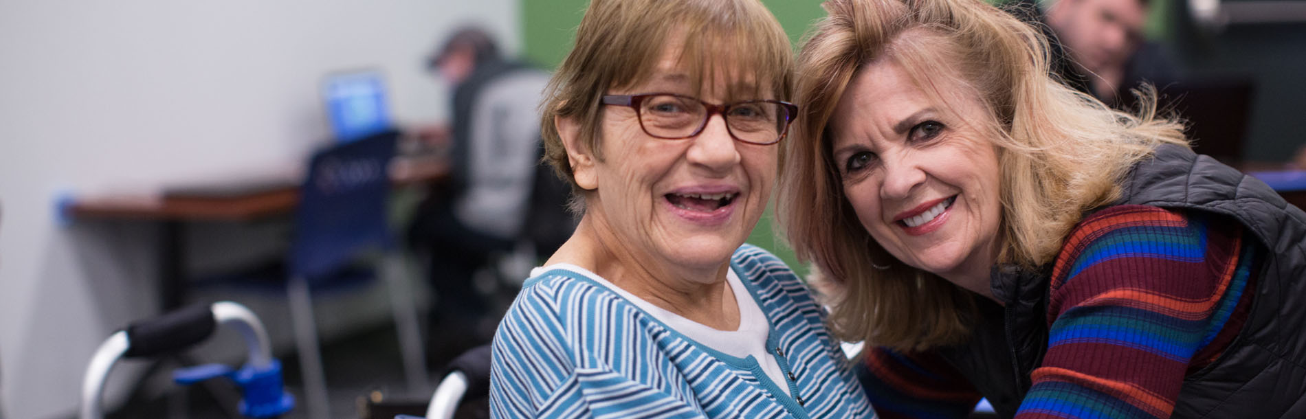 Friends smiling for photo at event