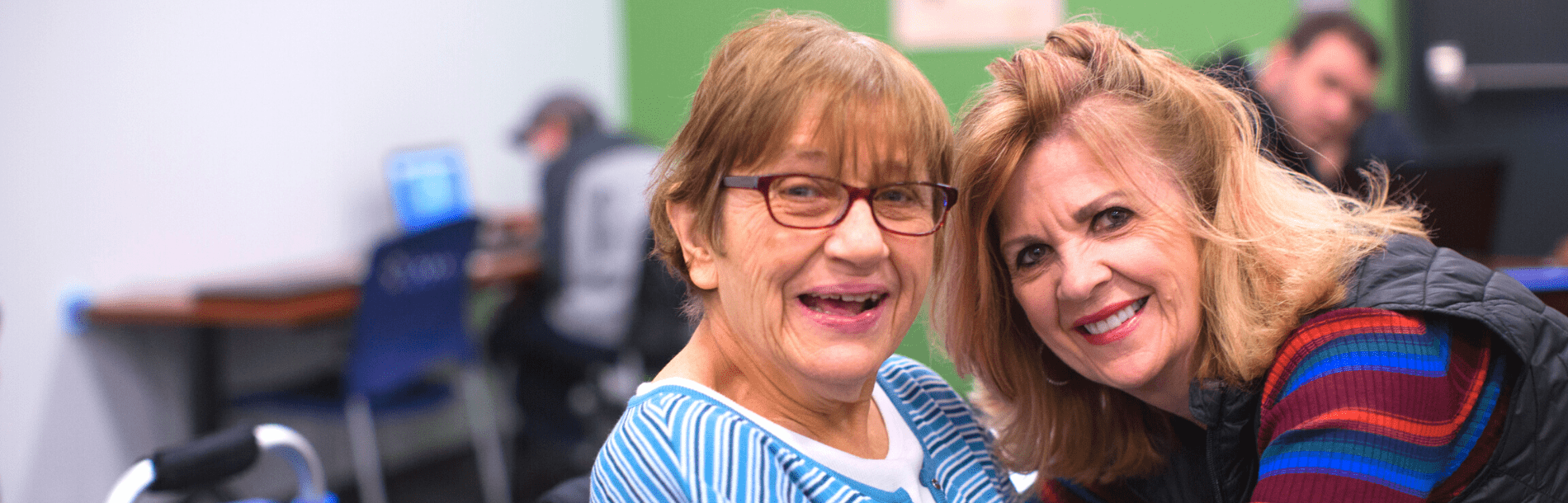 Two women smiling