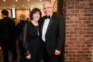 Cheryl and Kevin Barrows smiling at the Gala