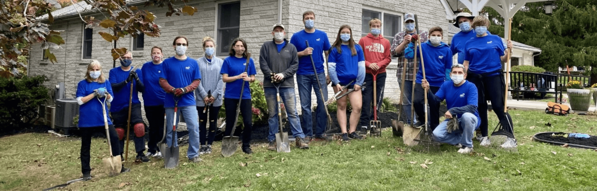 Header Image, Crew with shovels, rakes, and masks.