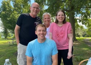 Family of 4 smiling