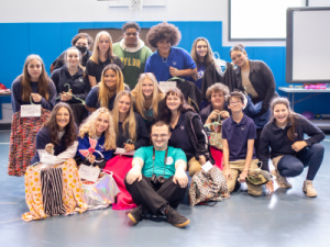 Fashion students showing off their designs.