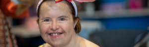 A woman smiling.