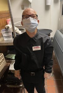 Charlie at his job at Outback Steakhouse.