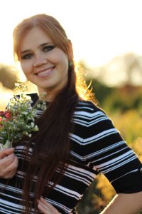 Kate S smiling for headshot