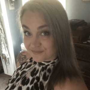 Sarah Therit smiling.