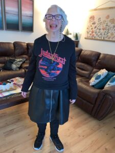 Rita poses in her Judas Priest t-shirt.