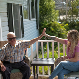 Jacey James high fives Frank Mansfield.