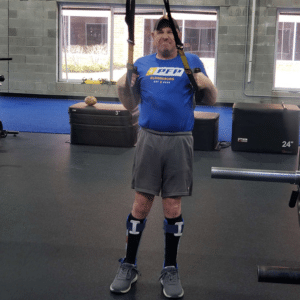 Dave trains hard at the gym.