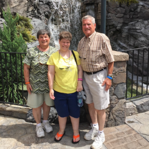Mandy Otto poses with her parents at one of her favorite places, Disney World!