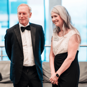 Kari Ebeling and Greg Kahlert stand together dressed in formalwear at the Gala.