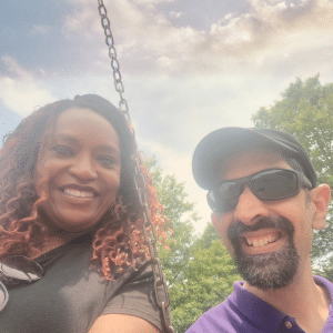 Daniella Amos and a person supported take a selfie