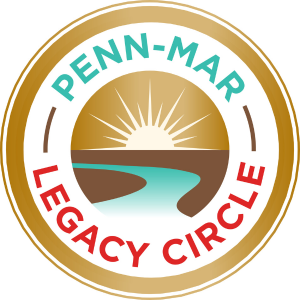 The Legacy Circle Logo is circular with a horizon with a sun and a river in the middle.